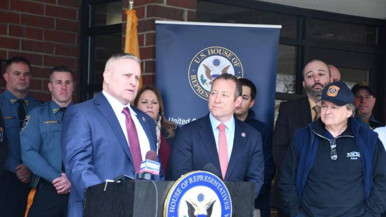 Newton Police Chief Steven VanNieuwland, left, speaks Jan. 17 in front of the municipal building. At center is Rep. Josh Gottheimer, D-5. (Photos courtesy of Rep. Josh Gottheimer)
