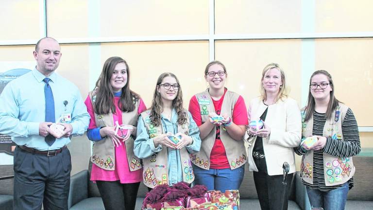 From left, Stephen Flynn, Donor Relations Manager, Newton Medical Center Foundation; Kaylin Botha; Gabby Dan; Theresa Jennings; Megan Sandow, Chief Development Officer, Newton Medical Center Foundation and Sophia Dan.