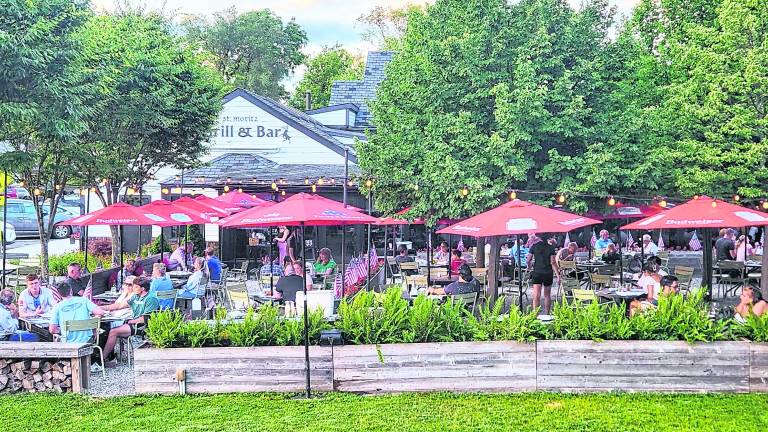 The exterior of St. Moritz Grill &amp; Bar is shown.