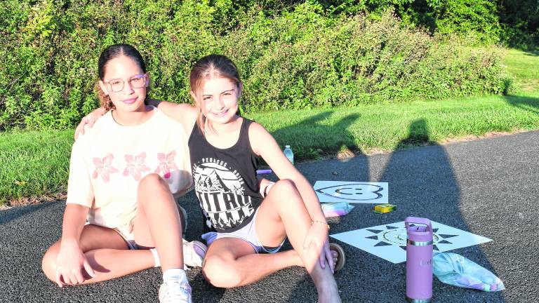 Mairin Corcoran and Evelyn Smith, both of Sparta, pose for a photo.