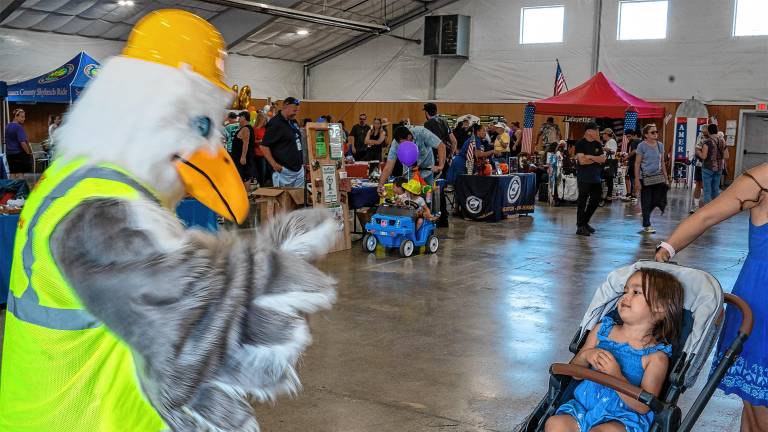 Sammy Seagull, the recycling mascot for the Sussex County Municipal Utilities Authority, greets Delilah Shone <b>during Sussex County Day on Sunday, Sept. 14. (Photos by Nancy Madacsi)</b>