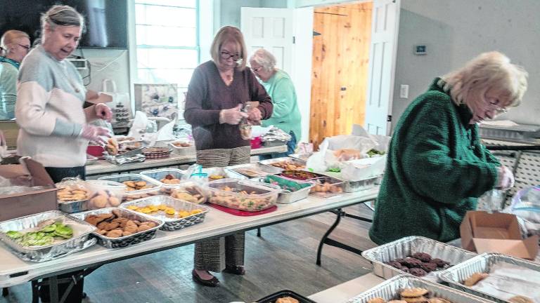 Tables full of cookies are shown.