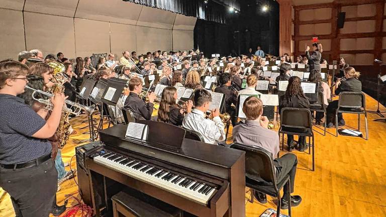 Deborah Prudenti Gianuzzi conducts a band concert at Sparta High School. She is retiring after a 34-year teaching career. (Photos provided)