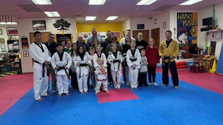 Five students earn Black Belt rank under Master Ken