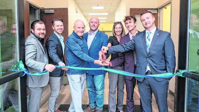 <b>James Santonastaso, Member, SCCC Board of Trustees; Jack Stafford, Supervisor of Optics Technology; Herb Yardley, Chair, SCCC Board of Trustees; Jason Fruge, Dean of Technical Occupations; Dr. Elizabeth Silverthorne, Vice Chair, SCCC Board of Trustees; Jack DeGroot, Deputy Director, Sussex County Commissioners; and Dr. Cory Homer, President, SCCC.</b>