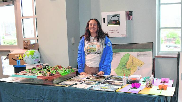 Lena Ouellette is shown representing SCMUA-Wallkill River Watershed and AmeriCorps NJ Watershed.