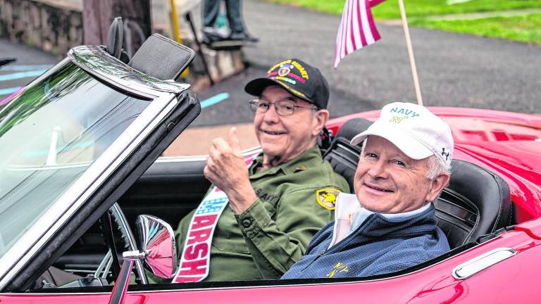 Grand Marshall Ed Liebig has a purple heart and was the former Vo Tech prinicpal.