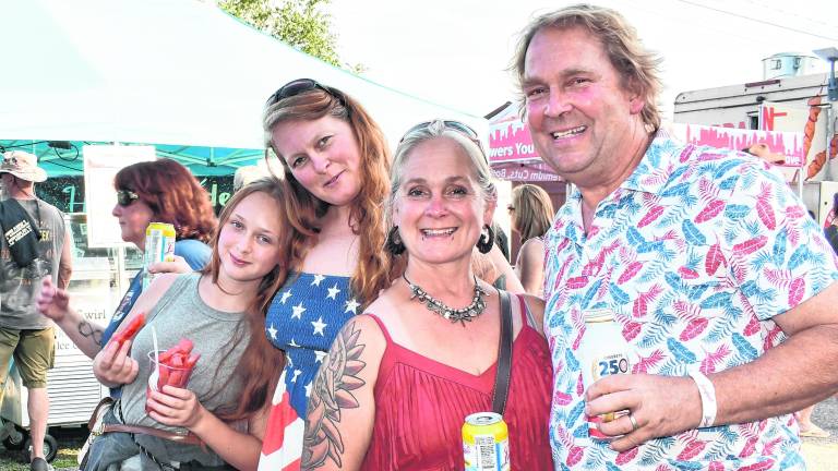 <b>Viola Judge, Kristy Zierenberg, Keri and Phil Brodhecker, all of Newton, pose for a photo.</b>