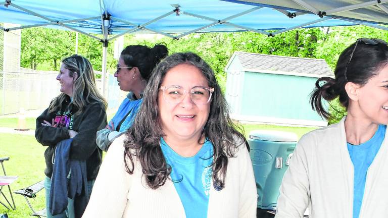 Lenore Davis of the Junior Women's Club of Sparta poses for a photo.
