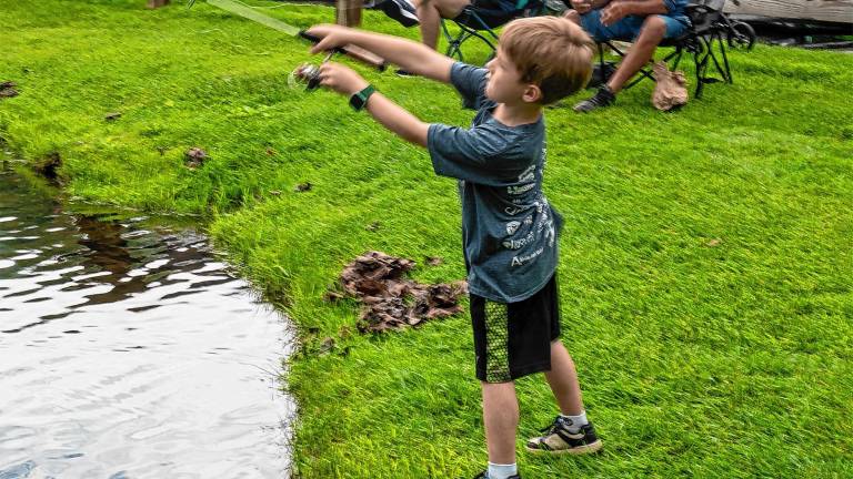 Lucas Shadwell casts his line during the Sparta Parks &amp; Recreation’s annual Trout Derby on Saturday, May 17 at the pond at Station Park. (Photos by Nancy Madacsi)