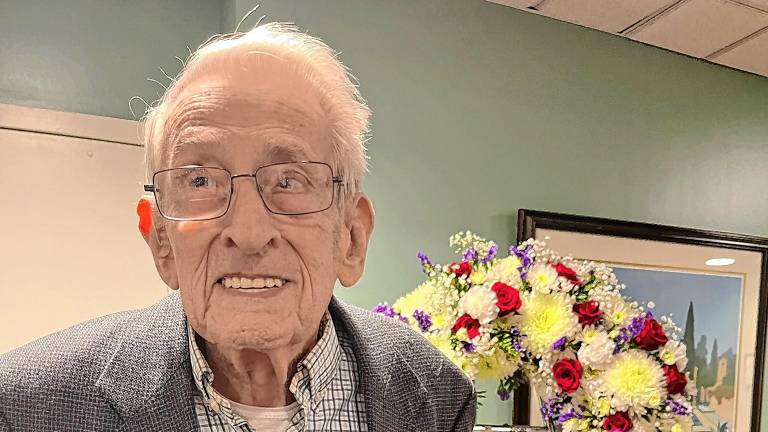 Ray Fein, 98, served in the Navy during World War II. He now lives at the Bristol Glen retirement community in Newton. (Photos provided)