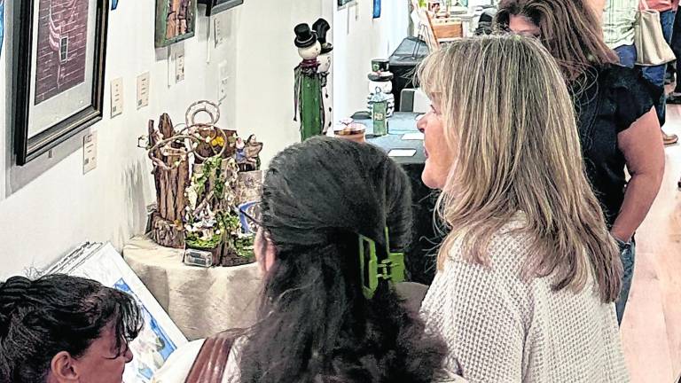 <b>Visitors enjoy the opening reception for the 2026 Sussex County Senior Citizens Art Exhibition at Sussex County Arts &amp; Heritage Council in Newton. The annual exhibition showcases artwork by Sussex County residents age 60 and over and is on view through October 1.</b>