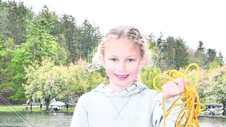 <b>Mackenzie Mielczarek of Sparta shows off her catch.</b>