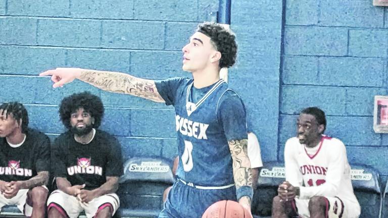 <b>Sussex County's Nico Sosa handles the ball in the second period.</b>