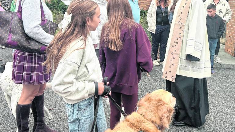 A large crowd gathered at Our Lady of the Lake Church on Oct. 4 for its annual Blessing of the Animals honoring the Feast of St. Francis of Assisi.