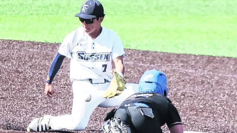 <b>Sussex Skylanders infielder Seiji Umezawa waits for the throw as Monroe Express runner Anthony Sanchez dives towards second base.</b>