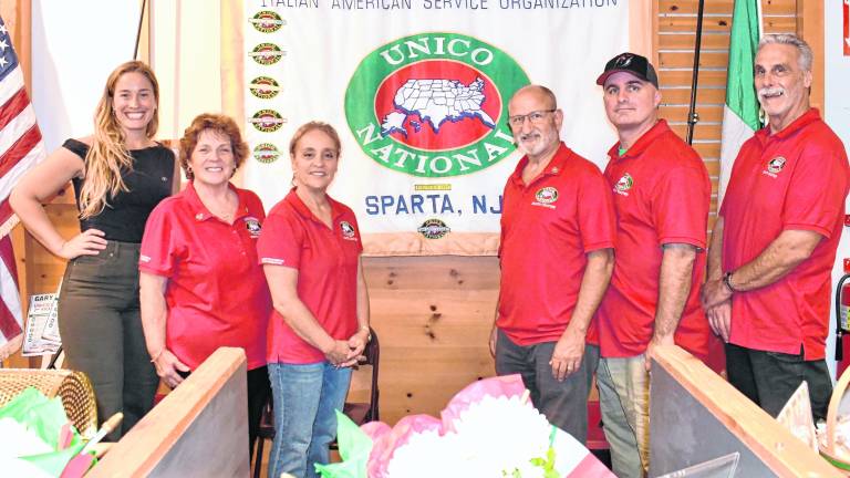 Emma DeLuca, Laura D'Uva, president of Sparta Unico, Teri-Ann Nocera, Gary D'Uva, Mike Schaaf and Vinny D'Aantoni pose for a photo.