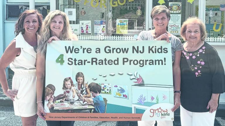 Staff members at Garden Grove Preschool pose for a photo.